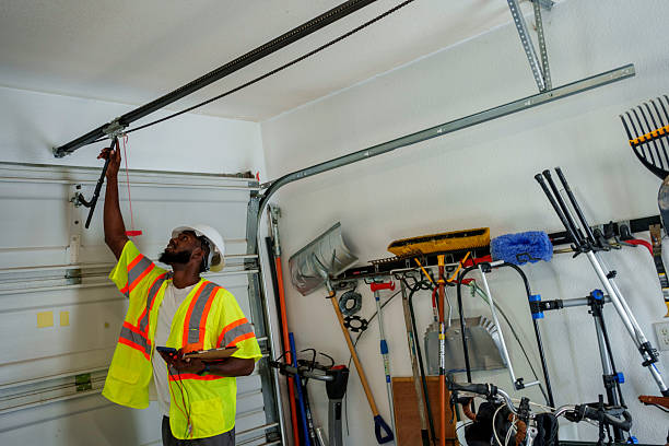 Professional Garage Door Installation technician working in Huntington, WV